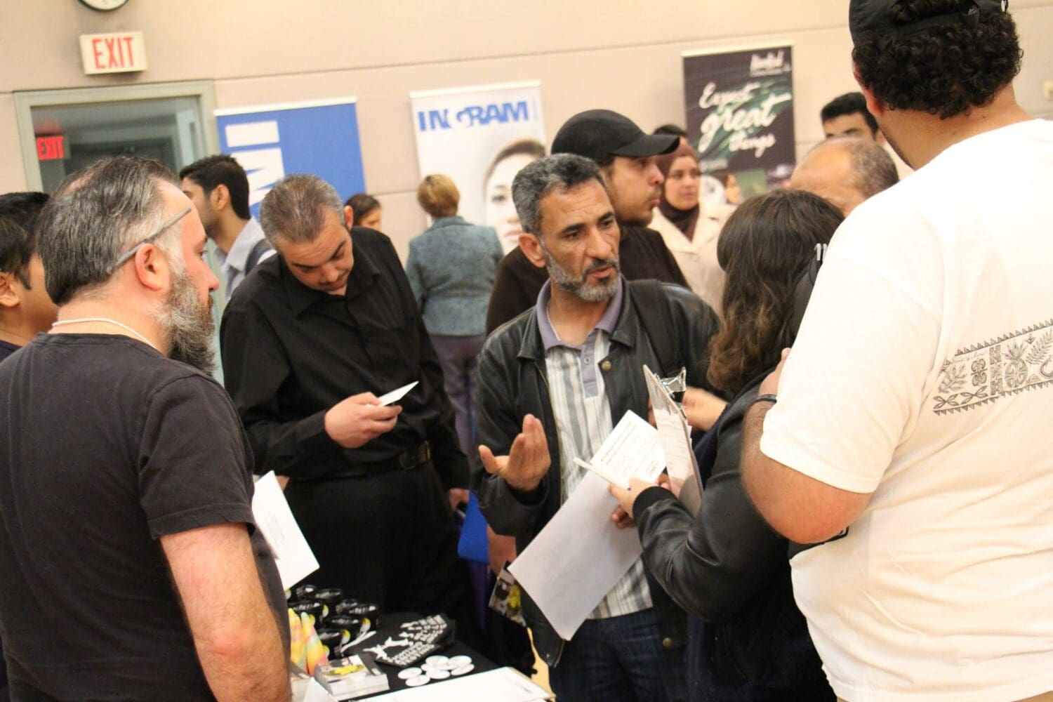 Employers connect to refugees job seekers at ISSofBC hiring fair