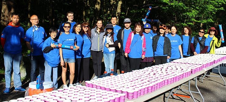 ISSofBC volunteers run water station for thirsty athletes