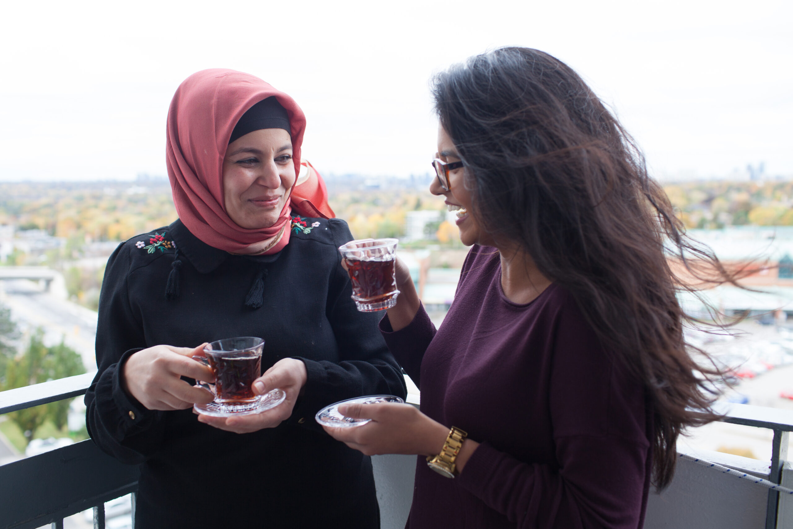 Together Project newcomer and volunteer sharing tea. Photo: Lisa Kannakko